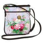 Anna Griffin Inc. Lillian Crossbody bag in cat pattern with adjustable strap and structured design.