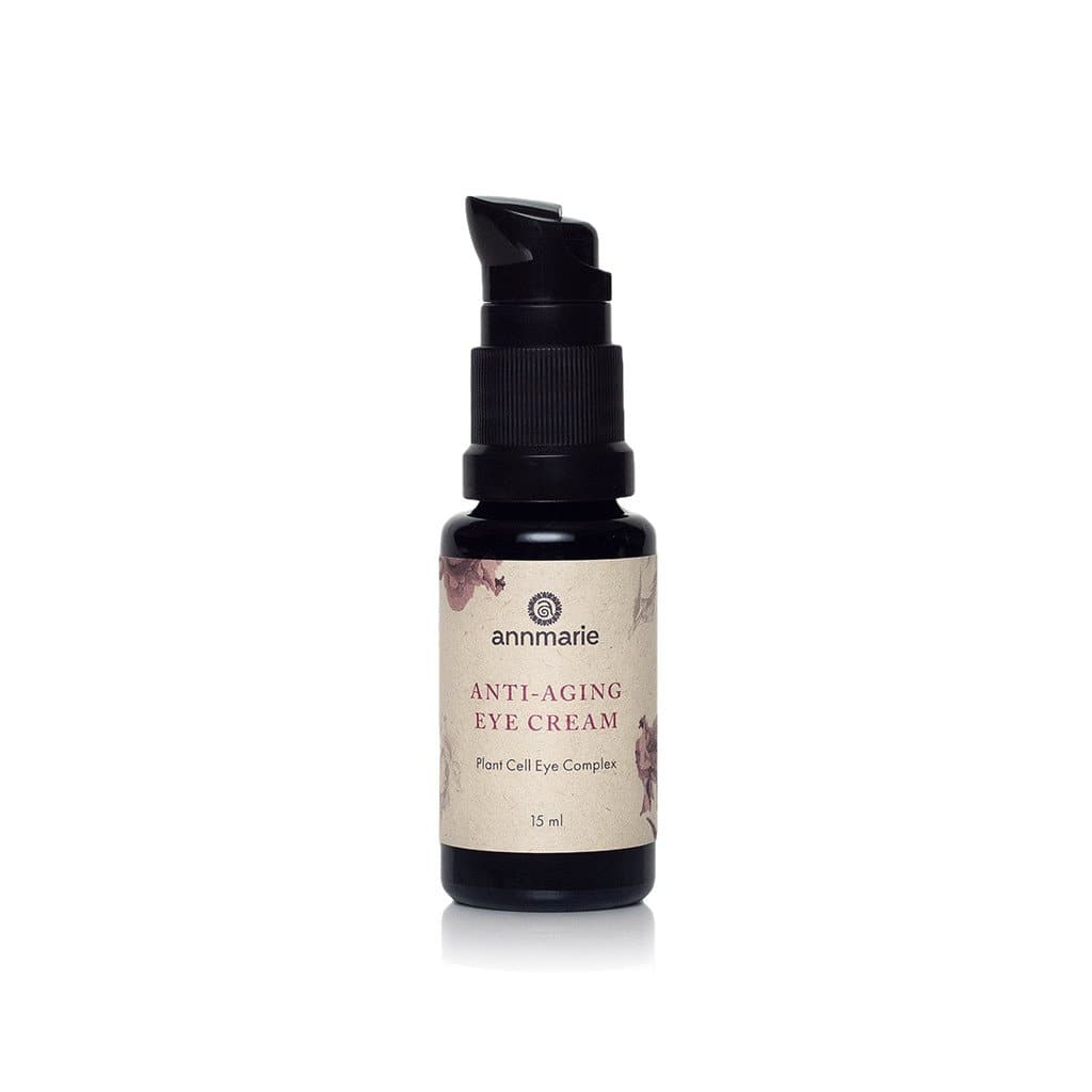 Anti-aging eye cream by Annmarie Skin Care in a 15ml jar, designed to reduce fine lines and brighten the delicate eye area.
