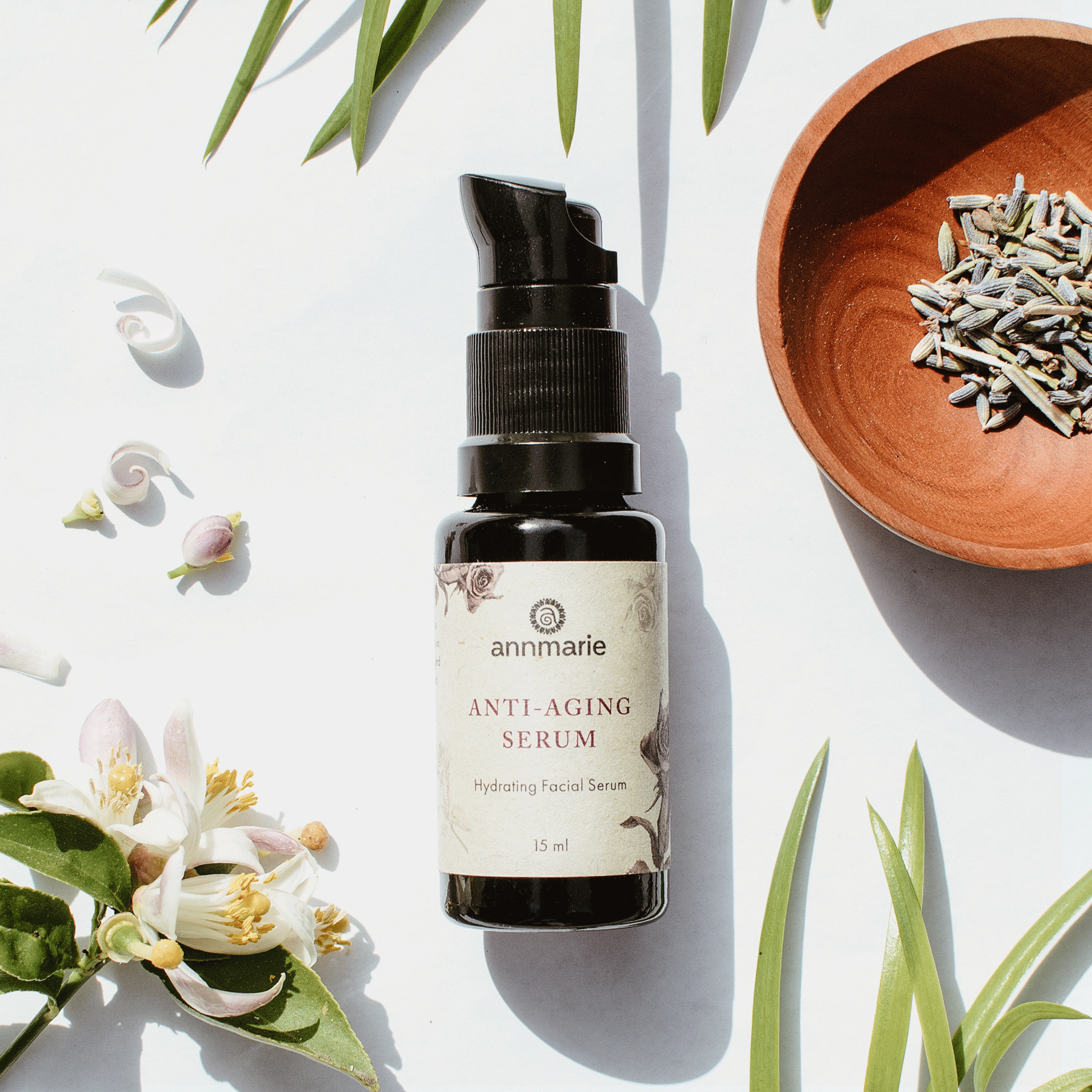 Anti-aging serum in 15ml bottle from Annmarie Skin Care, featuring a sleek design and clear labeling for youthful skin.