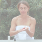 Annmarie Skin Care Anti-Aging Serum in 30ml bottle, featuring a clear glass container with a white pump dispenser.
