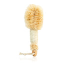 Exfoliating dry body brush by Annmarie Skin Care, natural wooden handle with soft bristles for skin exfoliation.