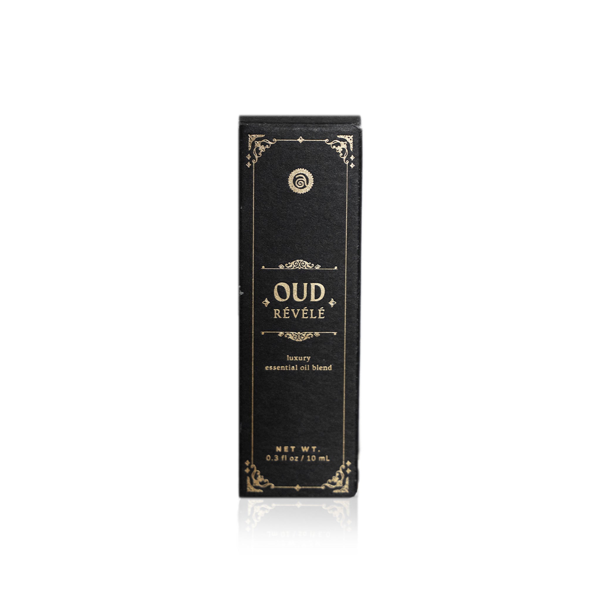 Bottle of Oud Révélé by Annmarie Skin Care, 10ml, a luxurious oud fragrance in a sleek container.