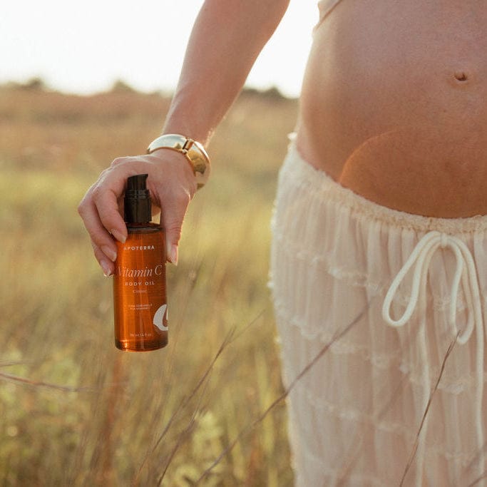Pregnancy-safe Apoterra Vitamin C Body Oil for bath and body, unscented, with a classic, nourishing formula.