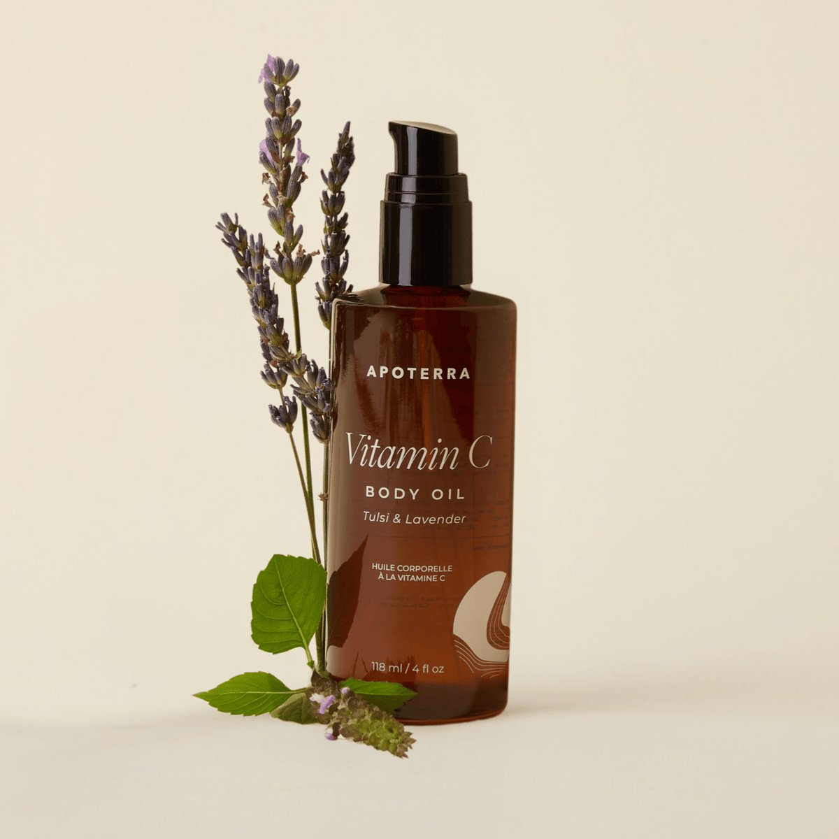 Apoterra Vitamin C Body Oil with tulsi and lavender for nourishing bath and body skincare, featuring a sleek bottle and calming ingredients.