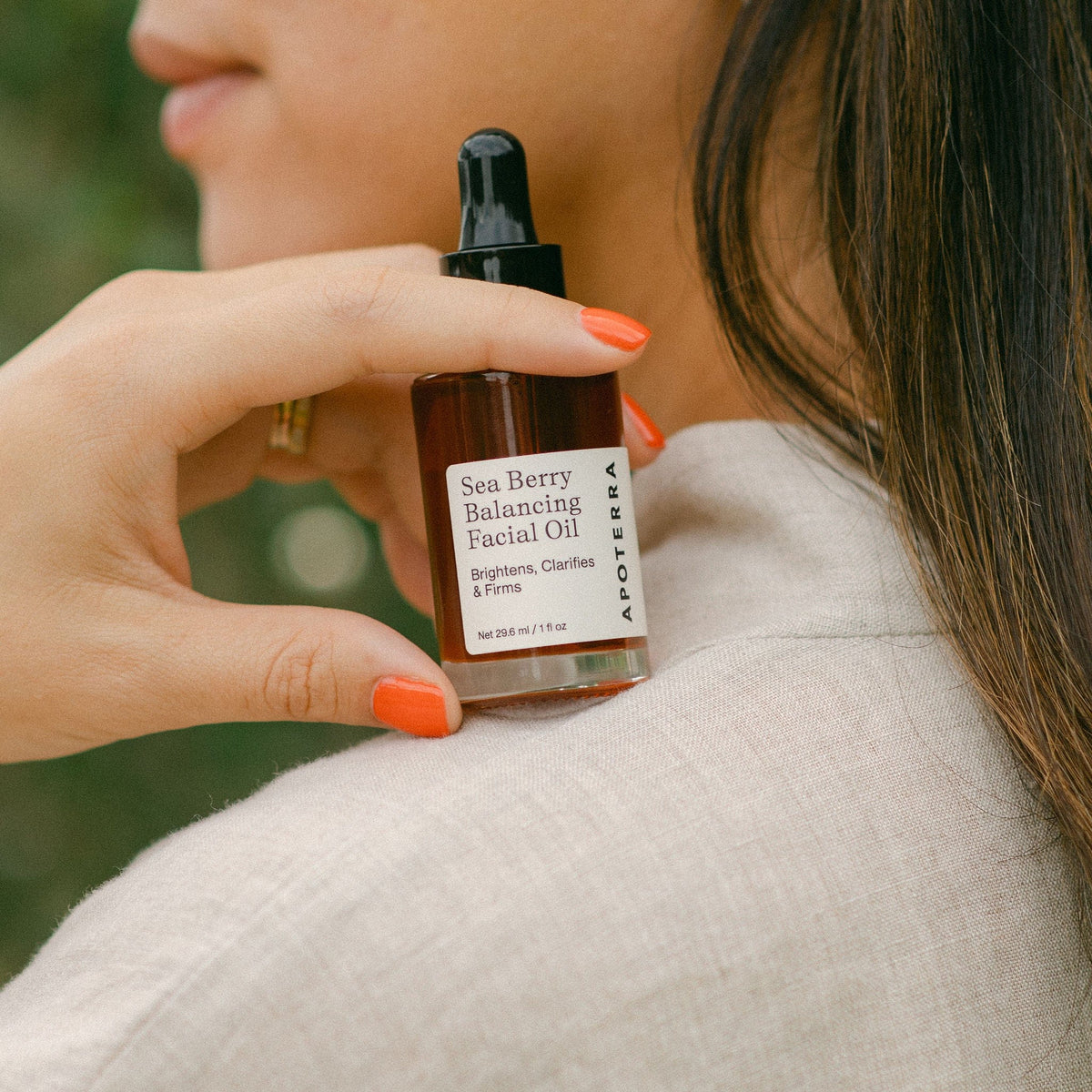 Apoterra Sea Berry Balancing Facial Oil bottle showing natural ingredients and sleek packaging for healthy skin.