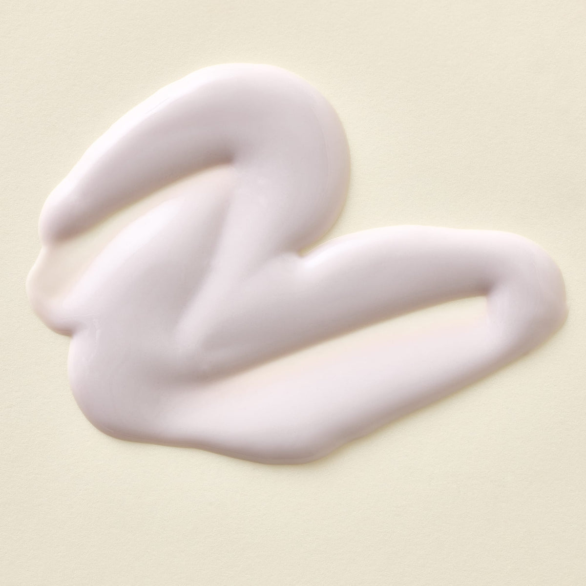 Apoterra Chamomile & Tansy Hydrating Cream Cleanser soap with creamy texture and herbal chamomile and tansy ingredients.