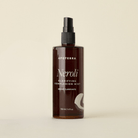 Apoterra Neroli Clarifying Complexion Mist in a spray bottle, featuring a light floral scent and clear liquid for skin refreshment.
