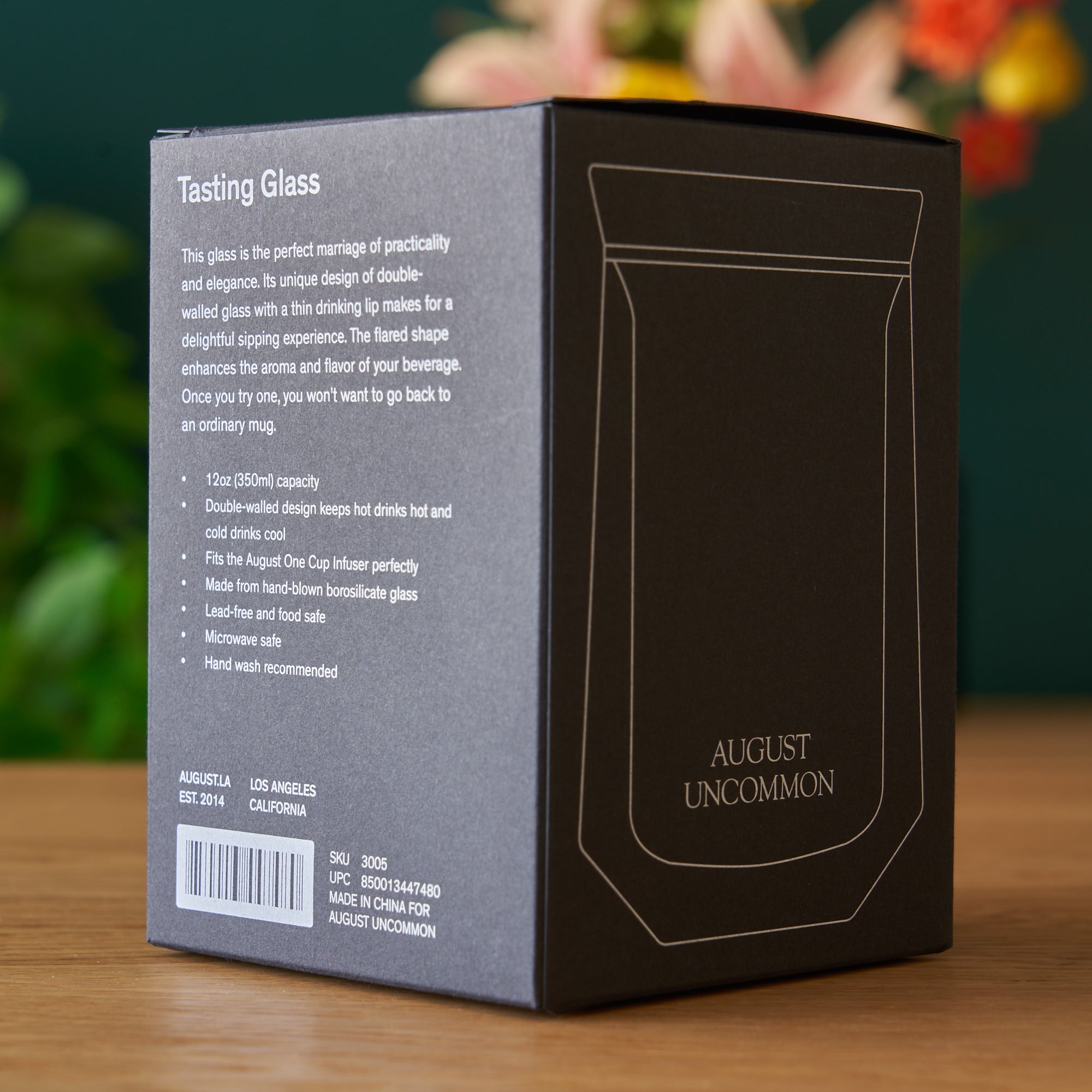 August Uncommon Tea tasting glass for tea, showcasing a clear glass vessel designed for a refined drinking experience.