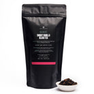 Smoky vanilla black tea bag from August Uncommon Tea, showcasing a black tea package labeled Breakfast variety.