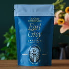 August Uncommon Tea Essentials Earl Grey Black Tea bag, premium black tea with bergamot flavor, in a 15-cup bag.