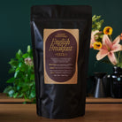 August Uncommon Tea Essentials English Breakfast Black Tea bag, premium black tea for brewing a hearty, full-flavored beverage.