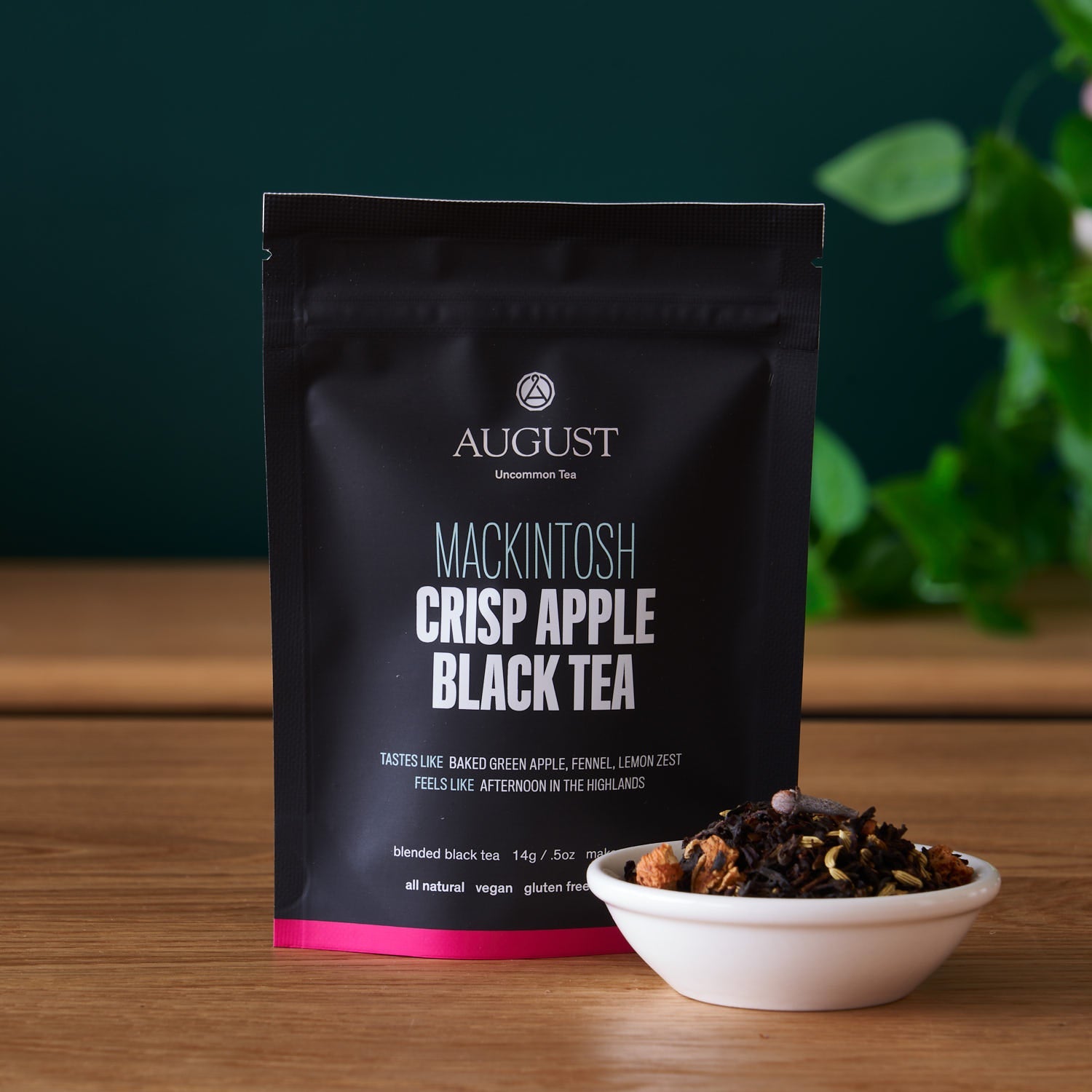 August Uncommon Tea Mackintosh Crisp Apple Black Tea in a 15-cup bag, showcasing fresh apple flavor and black tea leaves.