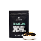 Black Lodge Smoky Banana Black Tea bag by August Uncommon Tea, showcasing the packaging for this flavorful black tea blend.