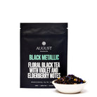 Black Metallic Violet Elderberry Black Tea tin from August Uncommon Tea, showcasing the elegant packaging of this black tea.