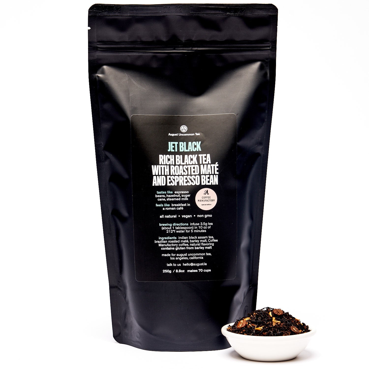 Jet Black Roasty Coffee Black Tea in a 28-cup tin by August Uncommon Tea, showcasing the rich black tea leaves inside.