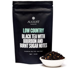 Low Country Bourbon Sugar Black Tea by August Uncommon Tea in a 28-cup tin, showcasing black tea leaves and packaging label.