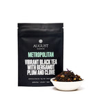 August Uncommon Tea Metropolitan Bergamot Plum Earl Grey Black Tea in 28-cup tin, showcasing the elegant packaging and tea blend.