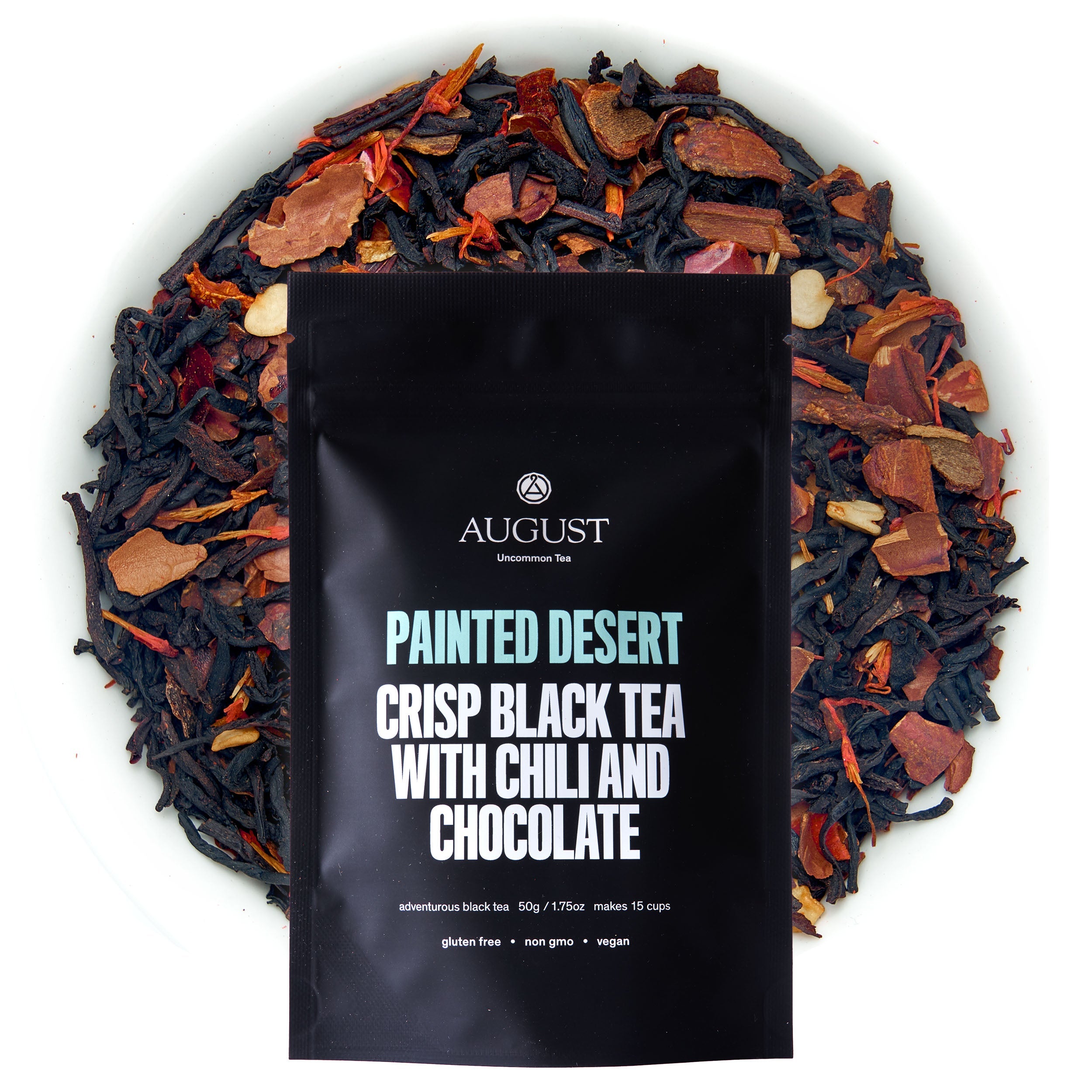 Black tea from August Uncommon Tea, Painted Desert Chocolate Chili flavor in a 28-cup tin, featuring rich chocolate and chili ingredients.