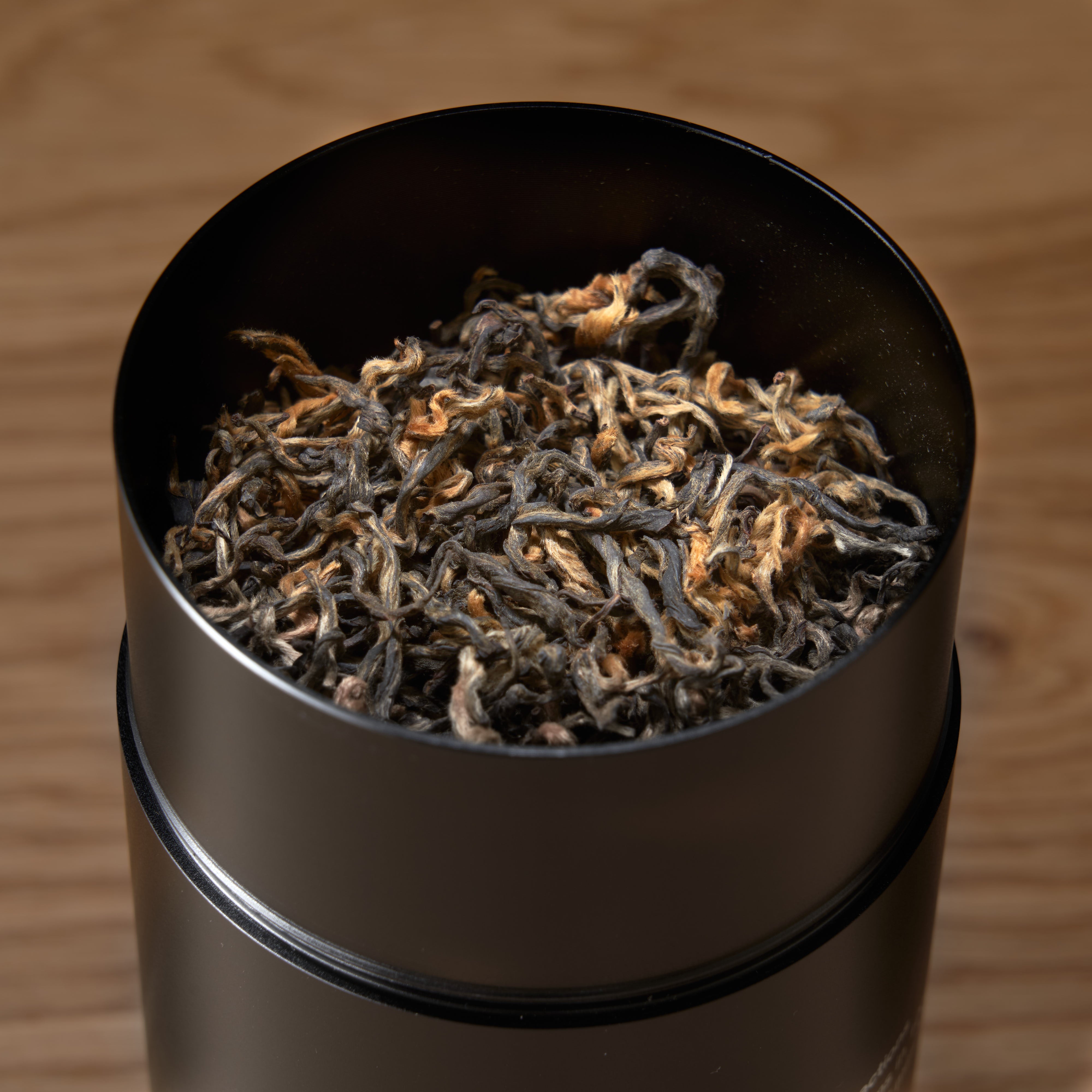 August Uncommon Tea Rare Leaves Gold Nepalese Black Tea in a 60g tin, showcasing whole black tea leaves from single estate Nepal.