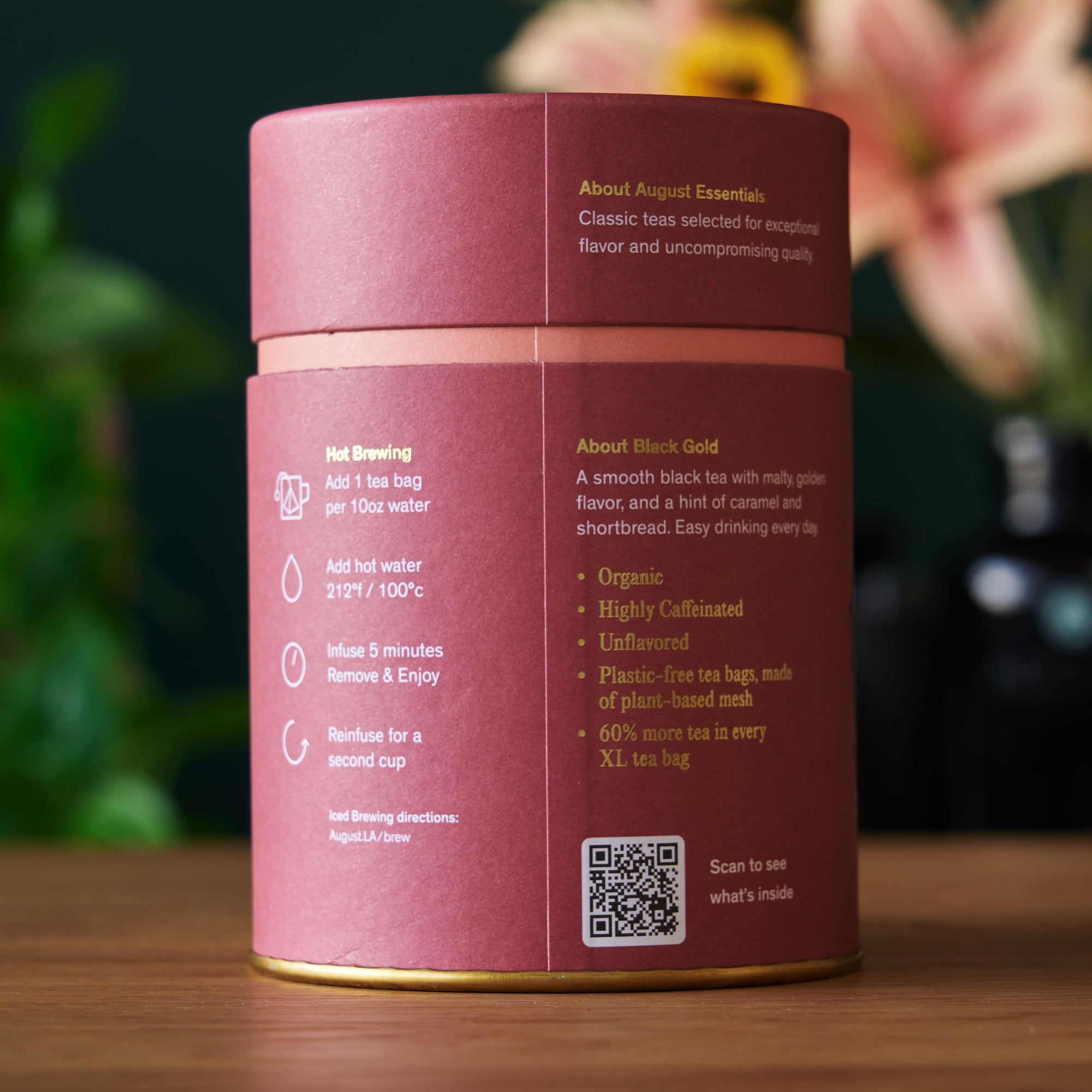Essentials Black Gold Black Tea by August Uncommon Tea in a box of 15 tea bags, featuring black tea leaves and packaging.