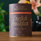 August Uncommon Tea Essentials English Breakfast Black Tea in 15 tea bags, featuring a box of black tea bags for brewing.
