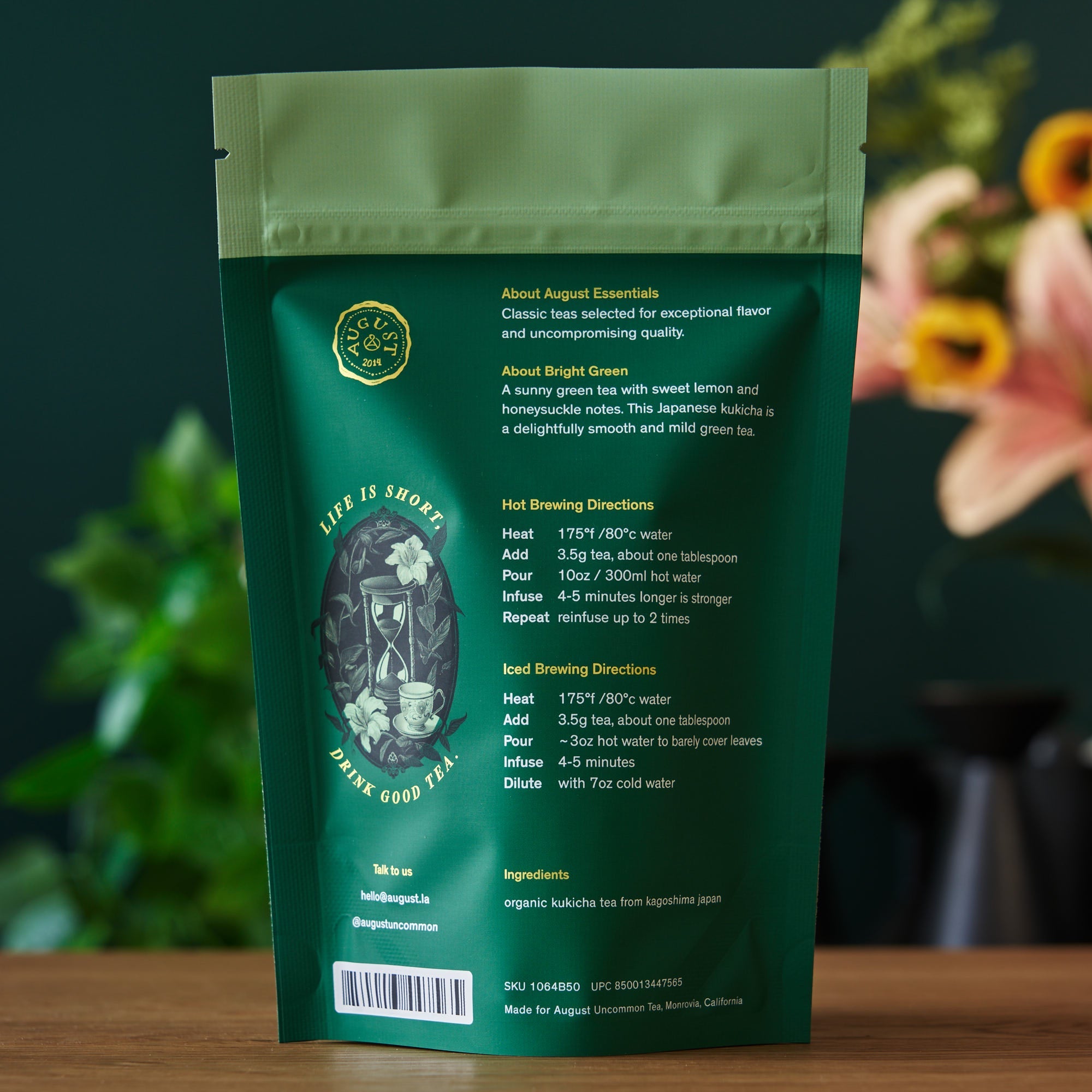 Bright green August Uncommon Tea Essentials Bright Green Green Tea in a 15-cup bag, showcasing fresh green tea leaves and packaging.