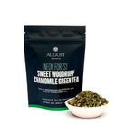 Neon Forest Apple Chamomile Green Tea by August Uncommon Tea in a 15-cup bag, vibrant packaging with green tea leaves and apple slices.