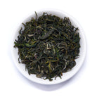 Rare Leaves Emerald Single Estate Pi Lo Chun green tea in a 60g tin, showcasing fresh green tea leaves from August Uncommon Tea.