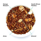 Biarritz Orange Amaretto Rooibos Tea bag by August Uncommon Tea, caffeine-free herbal tea with vibrant orange and almond flavors.