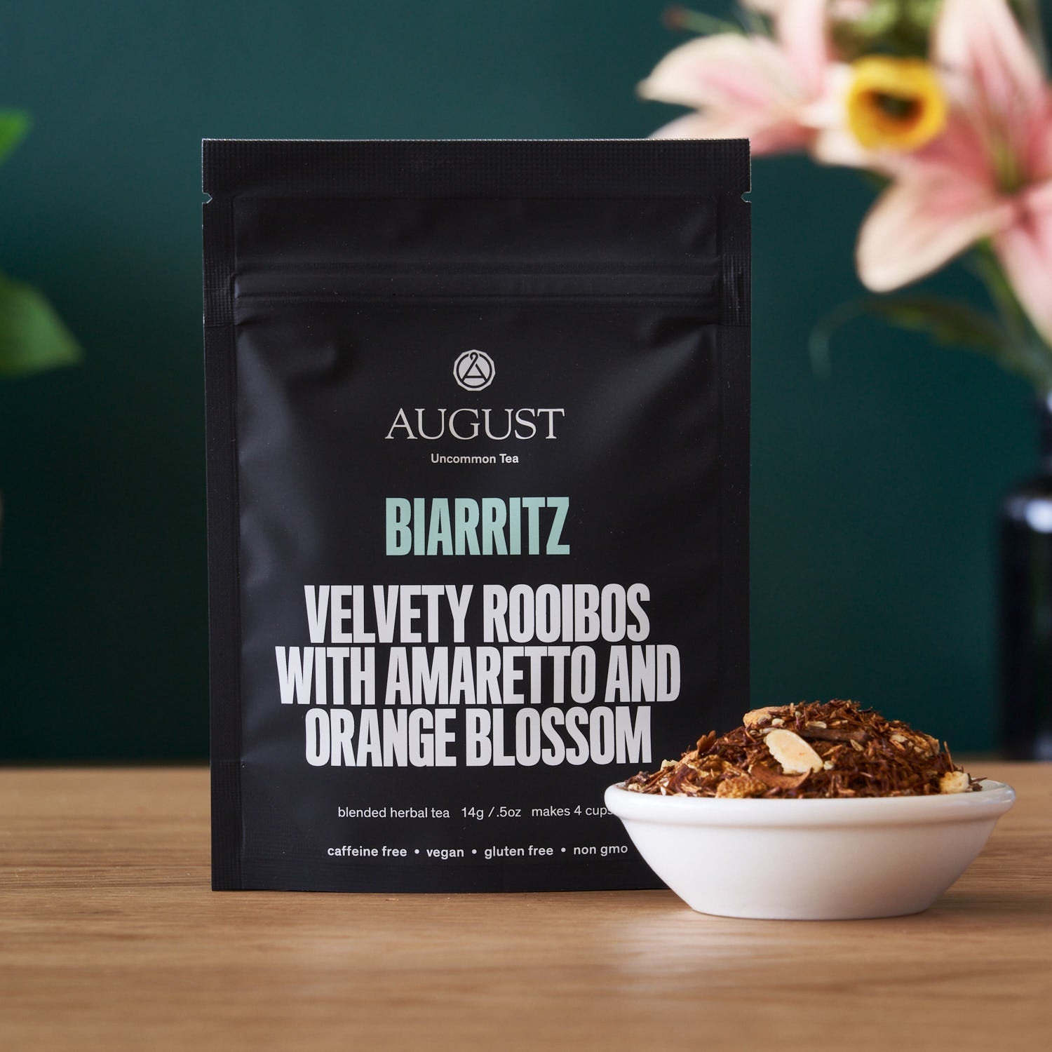 Biarritz Orange Amaretto Rooibos Tea bag by August Uncommon Tea, caffeine-free herbal tea with orange and amaretto flavor.