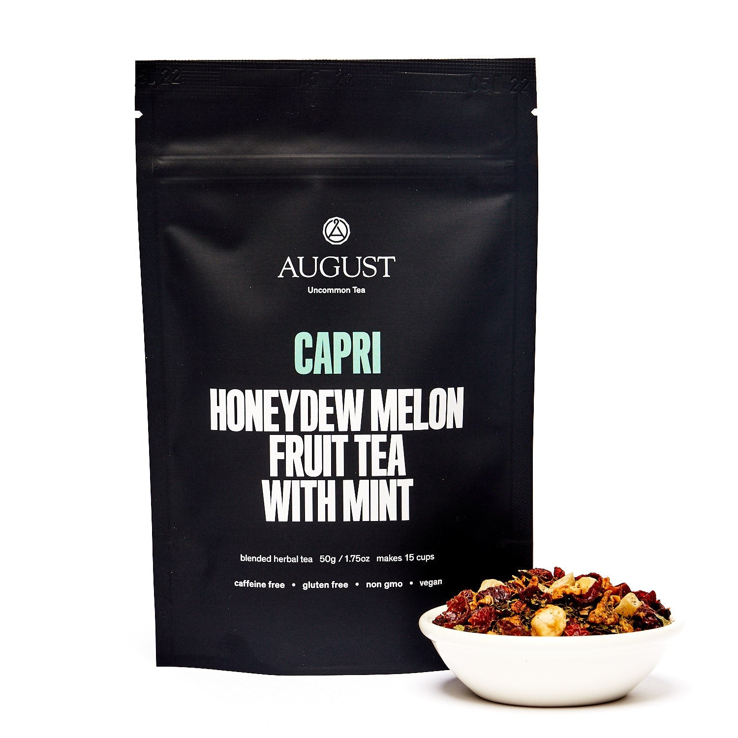 August Uncommon Tea Capri Honeydew Melon Mint Herbal Tea in a 15-cup bag, caffeine-free beverage with fresh melon and mint flavors.