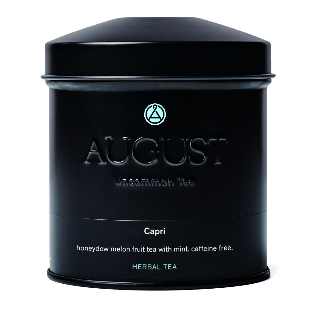 August Uncommon Tea Capri Honeydew Melon Mint Tea in a 15-cup herbal tea bag, caffeine-free, with fresh honeydew and mint ingredients.