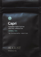 August Uncommon Tea Capri Honeydew Melon Mint Herbal Tea in a 15-cup bag, caffeine-free, with fresh melon and mint ingredients.