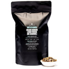 August Uncommon Tea Rhubarb Verbena Chamomile herbal tea bag, caffeine-free beverage with vibrant tea leaves and packaging.