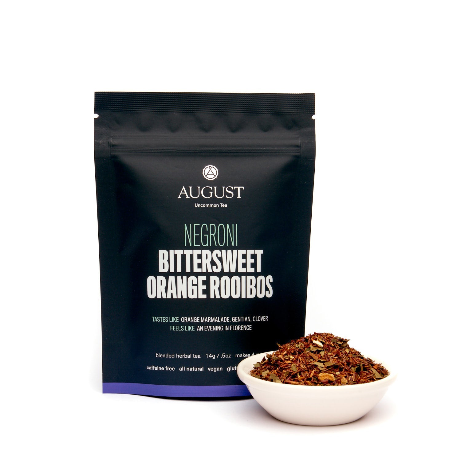 August Uncommon Tea Negroni herbal tea bag featuring bittersweet orange rooibos, caffeine-free beverage for tea lovers.