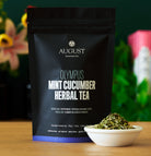 Olympus Mint Cucumber Herbal Tea bag by August Uncommon Tea, caffeine-free herbal tea with fresh mint and cucumber flavor.