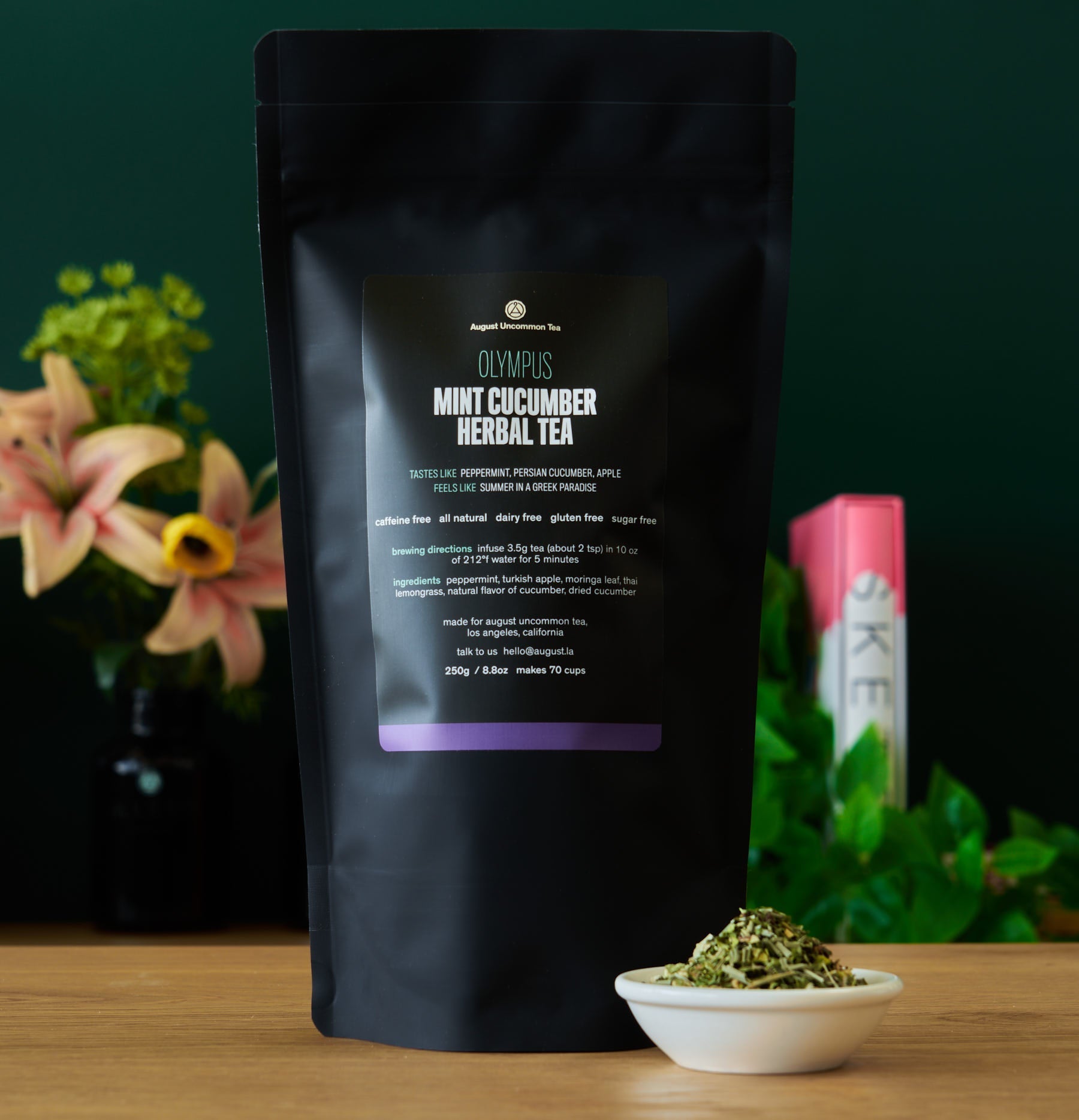 Olympus Mint Cucumber Herbal Tea by August Uncommon Tea, caffeine-free herbal tea in a 15-cup bag, with fresh mint and cucumber visuals