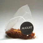 Psychocandy Roasted Pumpkin Caramel Rooibos Tea by August Uncommon Tea, caffeine-free herbal tea in a box of 15 tea bags.