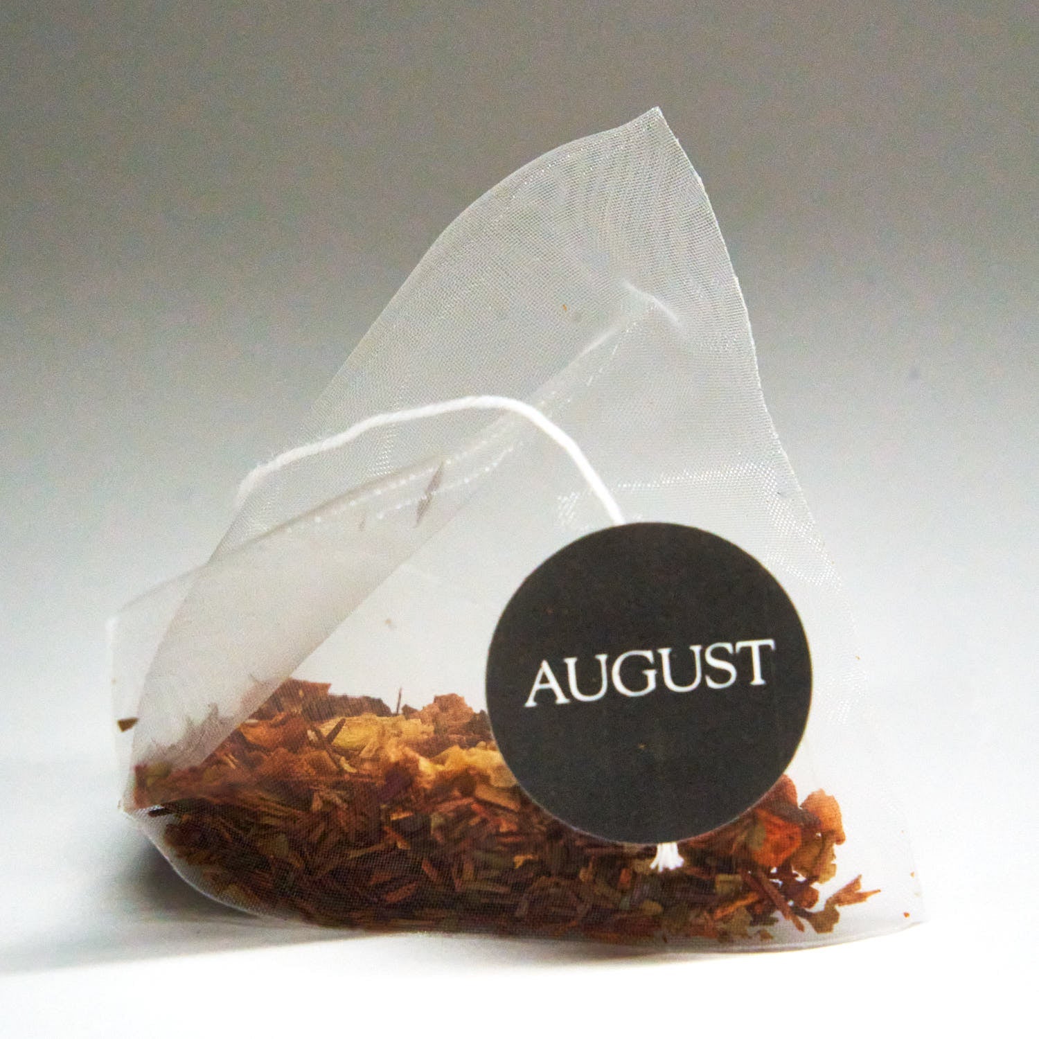 Psychocandy Roasted Pumpkin Caramel Rooibos Tea by August Uncommon Tea, caffeine-free herbal tea in a box of 15 tea bags.