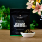 Bag of August Uncommon Tea Superbloom Sweet Lemon Oolong Green Tea, loose leaf tea in a 15-cup bag