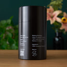 Black Pearl Oolong Tea by August Uncommon Tea in a 150g tin, showcasing dark roasted Taiwanese oolong tea leaves.
