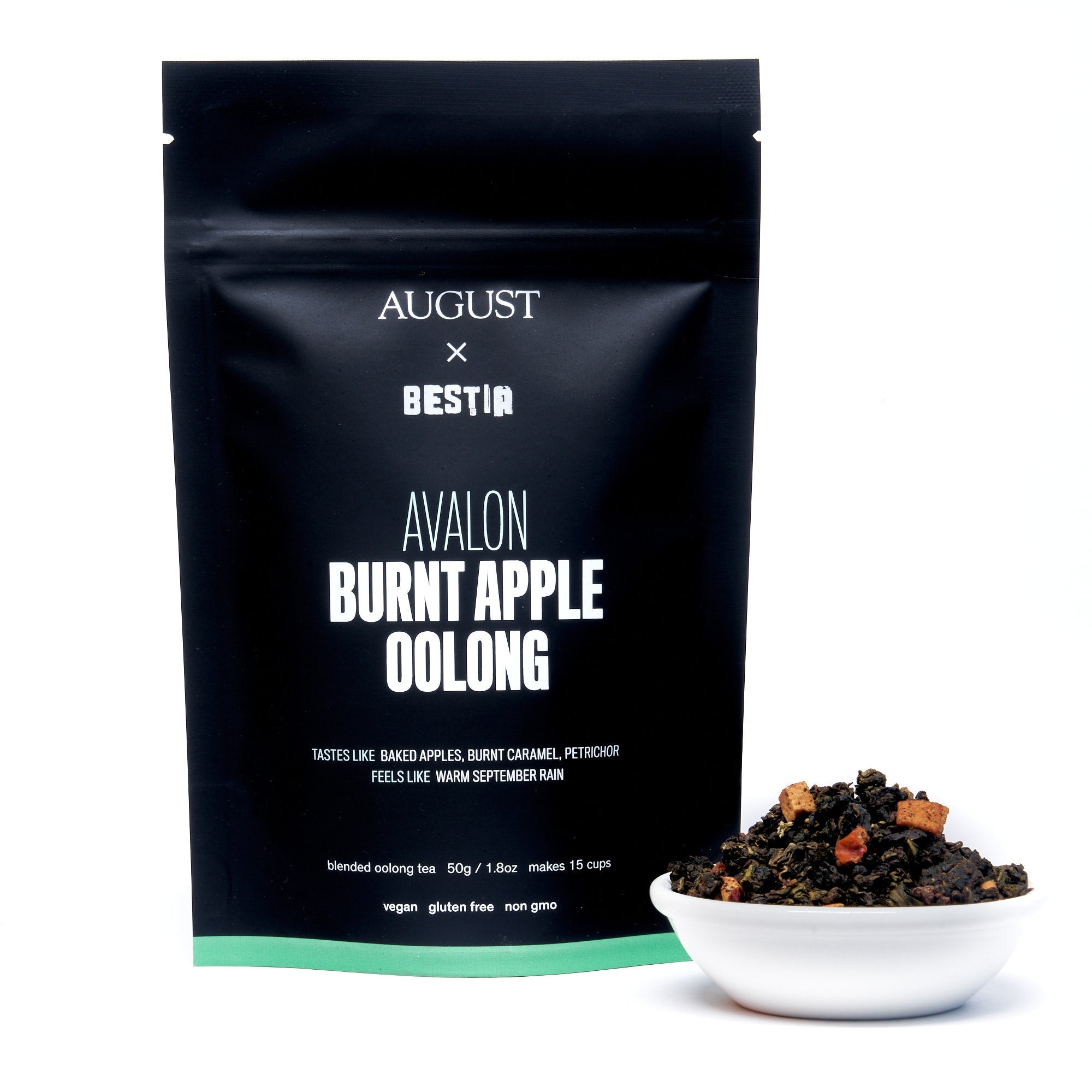 August Uncommon Avalon Burnt Apple Oolong Tea in a tin, showcasing the tea leaves and packaging for this aromatic oolong beverage.
