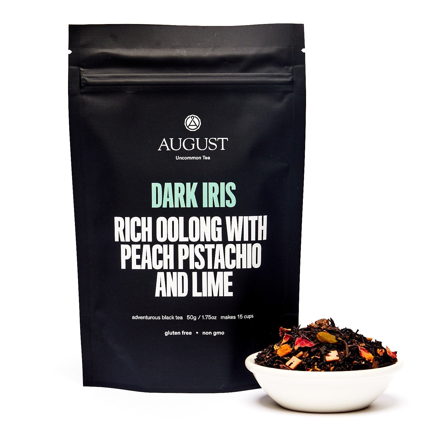 Dark Iris Peach Pistachio Oolong Tea tin by August Uncommon Tea, featuring vibrant packaging for this flavorful oolong tea blend.