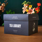 Deluxe 30 Tea Sampler from August Uncommon Tea featuring a variety of tea bags in elegant packaging for tea tasting.