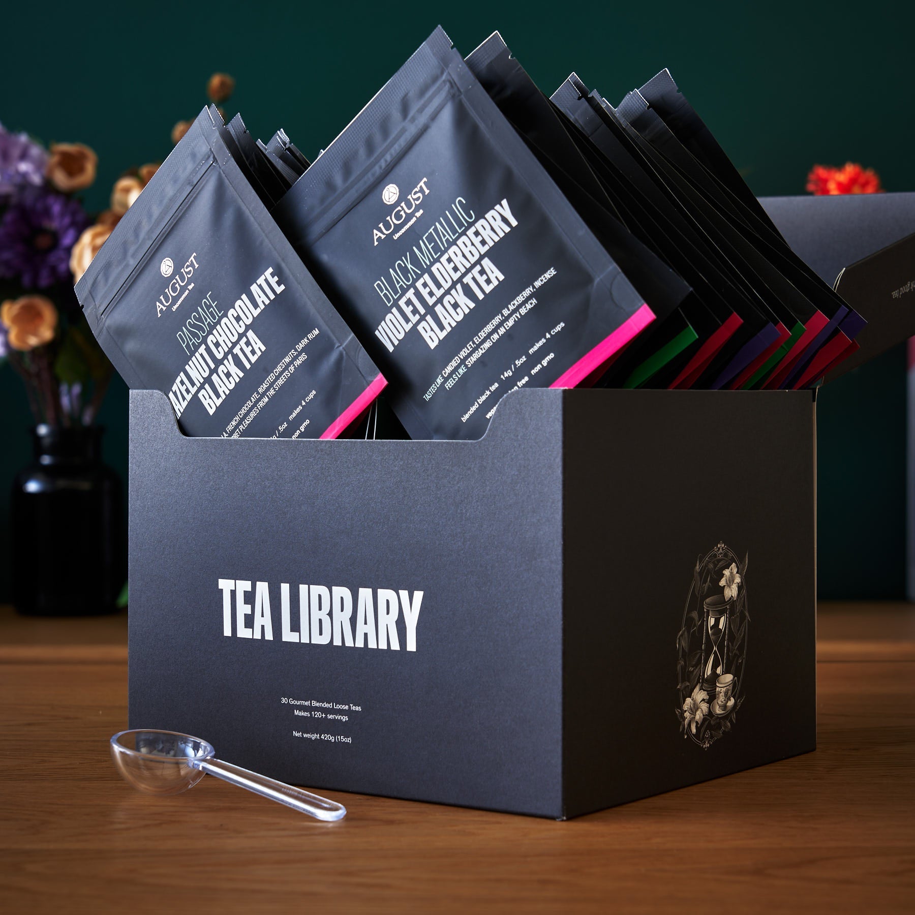 August Uncommon Tea Library Deluxe 30 Tea Sampler with assorted tea bags, showcasing a variety of teas for tasting.