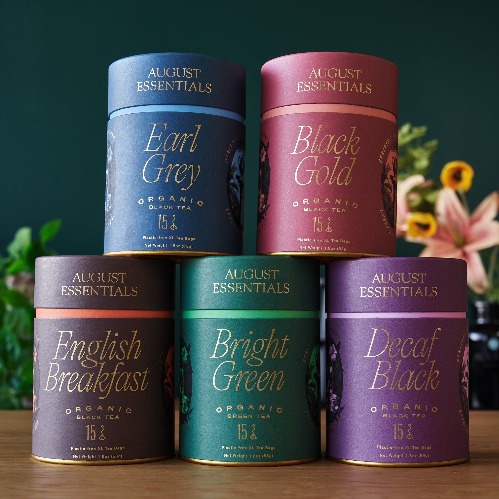 Assorted August Uncommon Tea All The Essentials tea bag bundle with various tea flavors in individual sachets.