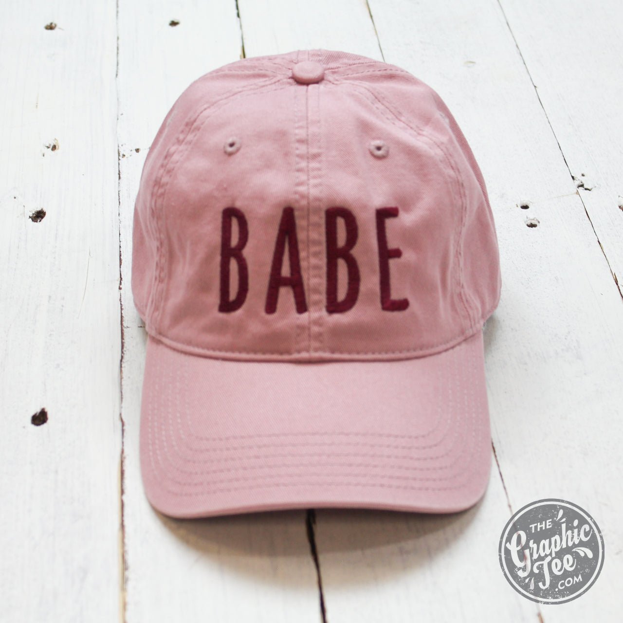 Dusty rose relaxed twill dad hat by Babe, casual cap with curved brim and adjustable strap, from The Graphic Tee.