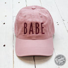 Dusty rose relaxed twill dad hat by Babe, casual cap with curved brim and adjustable strap, from The Graphic Tee.