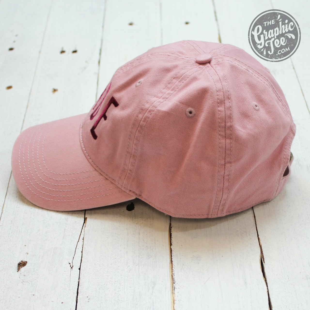 Dusty rose relaxed twill dad hat by Babe featuring a casual cap design with a curved brim and adjustable strap.