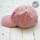 Dusty rose relaxed twill dad hat by Babe featuring a casual cap design with a curved brim and adjustable strap.